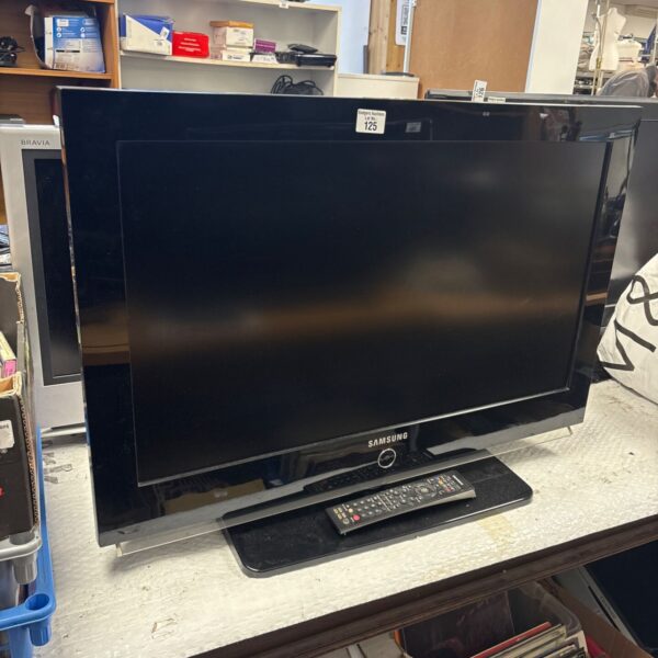 Samsung 32 inch LED TV with remote control, untested condition.