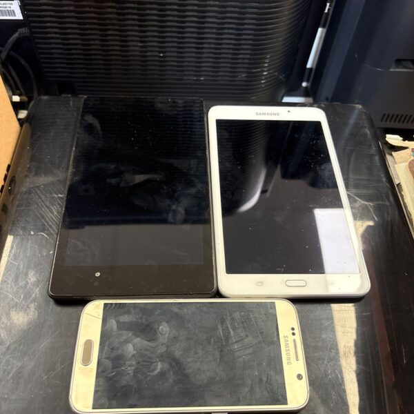 Samsung and Asus tablets with a smartphone in a lot.