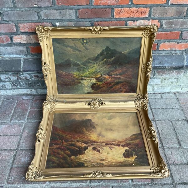 Vintage Scottish Highland prints in gilt frames depicting a waterfall and cattle.