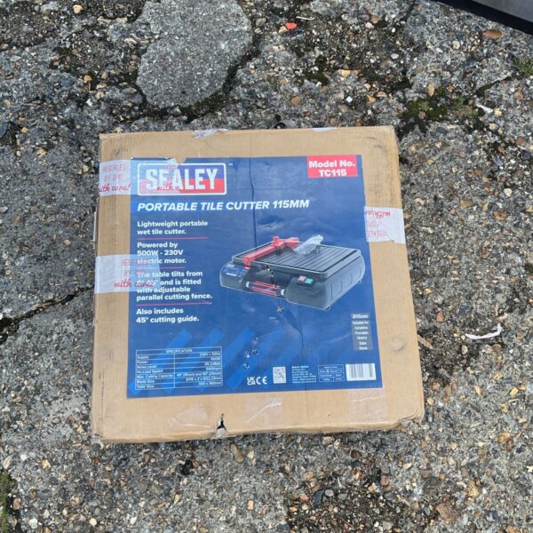 Searley TC115 portable wet tile cutter in used condition.