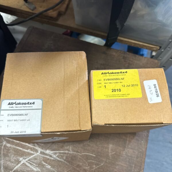 New seat belt assembly EVB00550LN in original packaging.
