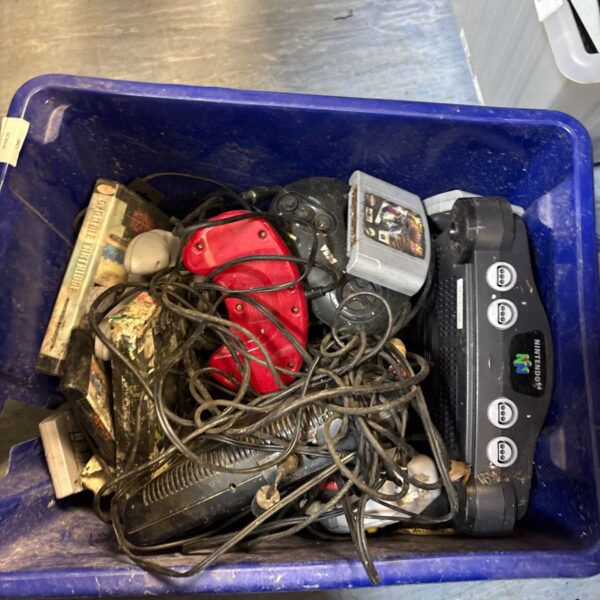 Sega Megadrive and Nintendo 64 console bundle with games and controllers.