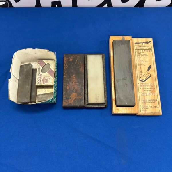 Vintage sharpening stones including a Faithfull combination oil stone.