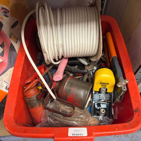 Shed clearance lot with electric cable and assorted tools.
