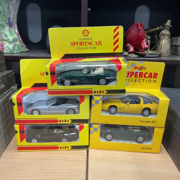 Shell Classic Sportscar Collection diecast cars in original packaging.