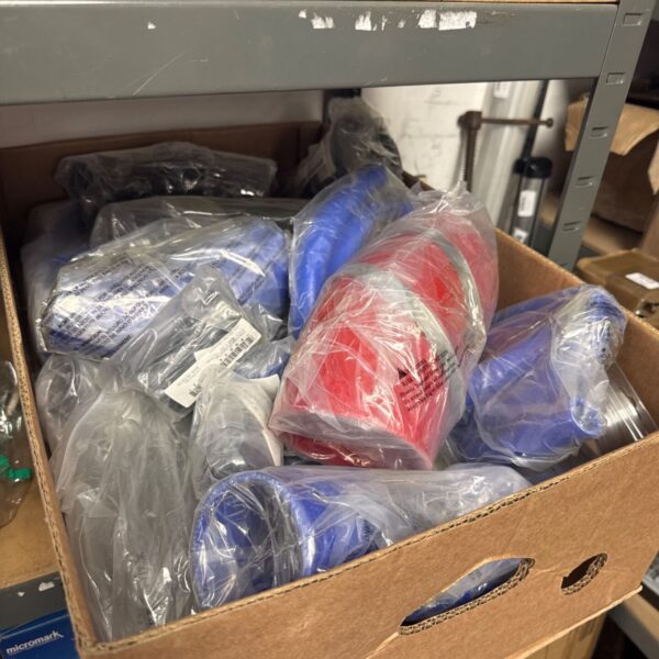 Assorted silicone hoses in packaging for automotive applications.