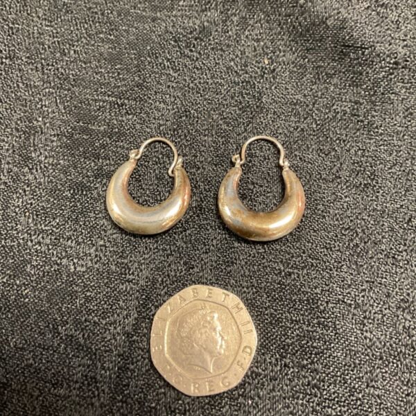 Pair of vintage 925 silver hoop earrings, classic jewellery.