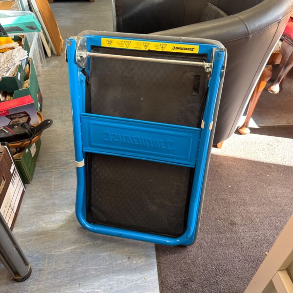 Blue Silverline folding trolley with mesh platform.