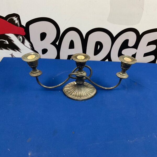 Ornate silverplate candelabra, a vintage table centerpiece.