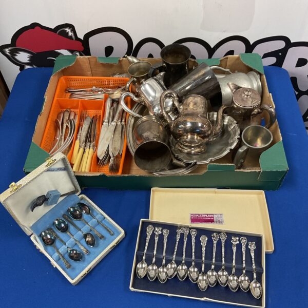 Vintage silverplate cutlery tray with teaspoons and mixed items.