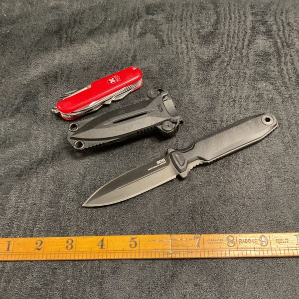 Knife lot featuring a SOG boot knife and Swiss Army knife.