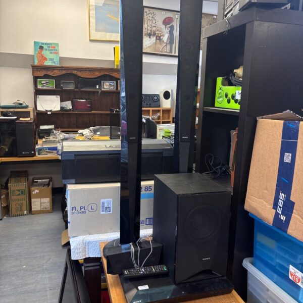 Sony BDV-E4100 home cinema system with multiple speakers in used condition.