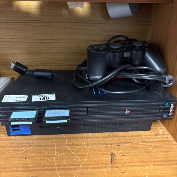 Sony PlayStation 2 console, model SCPH-30004, for retro gaming.