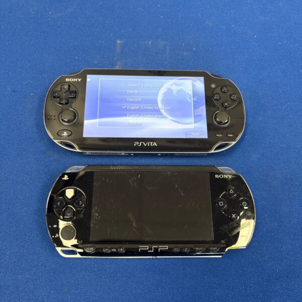 Sony PS Vita handheld console in grey, front view.