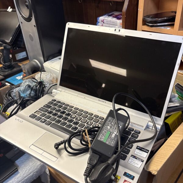 Vintage Sony Vaio PCG-3J1M laptop with charger for sale.