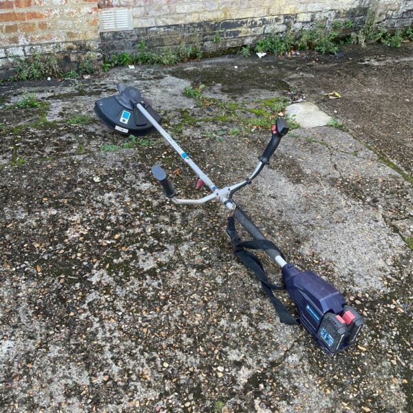 Spear and Jackson cordless strimmer for garden maintenance.