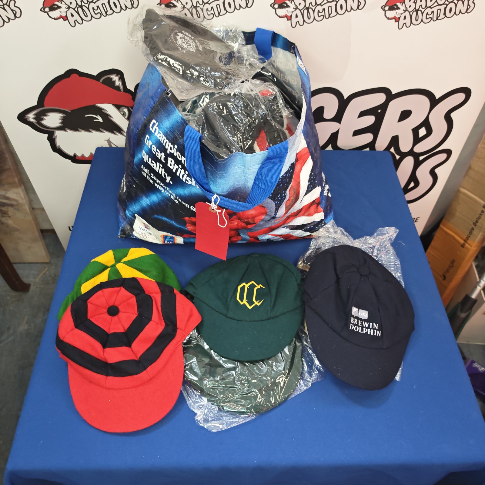 Mixed lot of vintage sporting caps including Brewing Dolphin design.