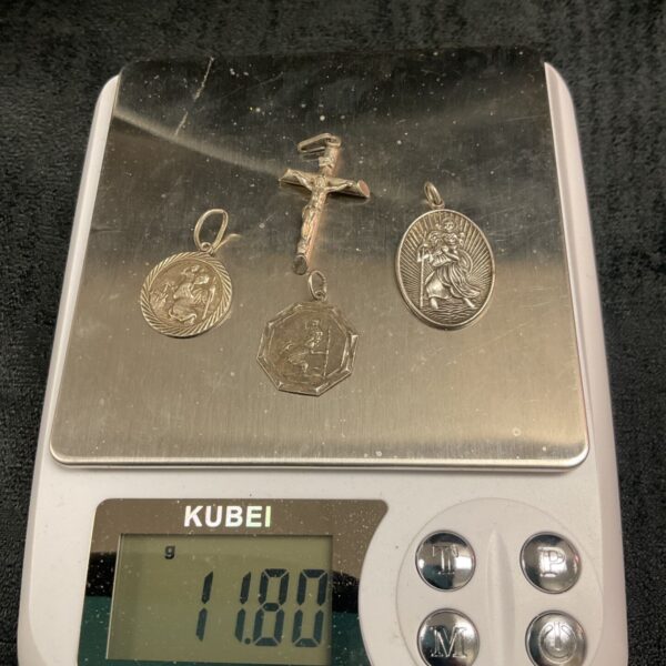 Vintage sterling silver St Christopher medallions and crucifix pendant.
