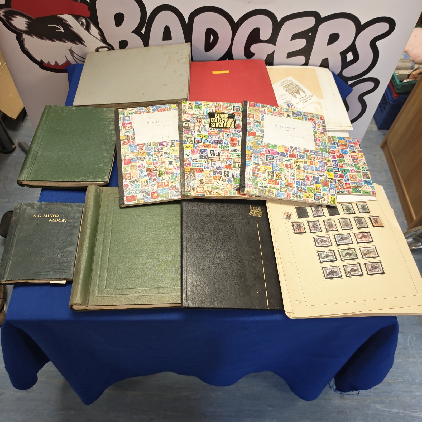 Vintage stamp albums with a diverse stamp collection inside.
