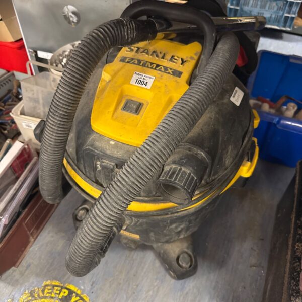 Used Stanley Fatmax site hoover for construction and workshop cleaning.