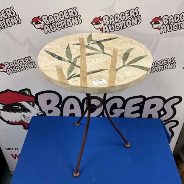 Small stone top accent table with bamboo mosaic design.