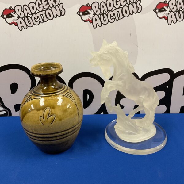 Salt glazed pottery vase and frosted lucite unicorn sculpture.