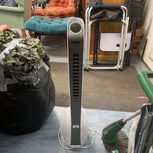 White Stylec tower fan, model MTTF1288U, for cooling.