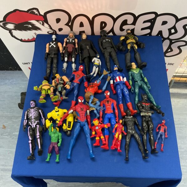 Diverse collection of superhero action figures including Spiderman and Batman.