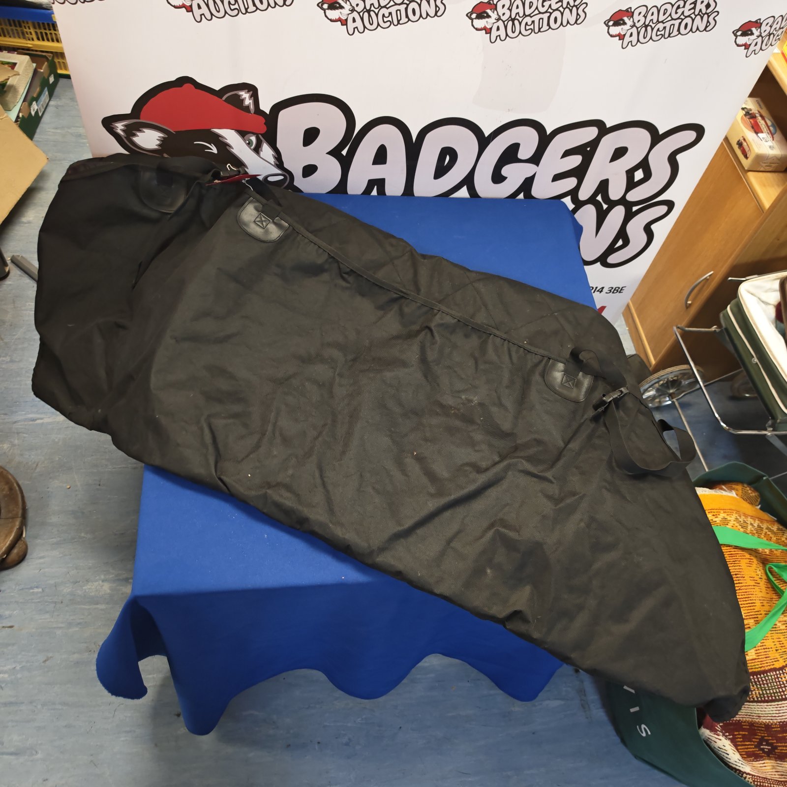 Used SUV rear seat cover for vehicle protection.