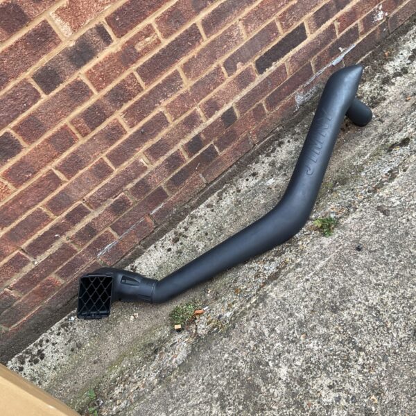 Black Suzuki Jimny snorkel kit for off-road vehicle.
