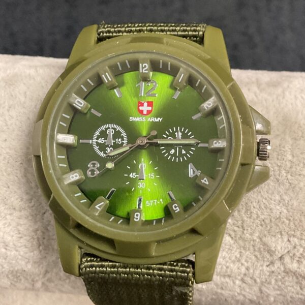 Vintage Swiss Army military style quartz wristwatch with green strap.