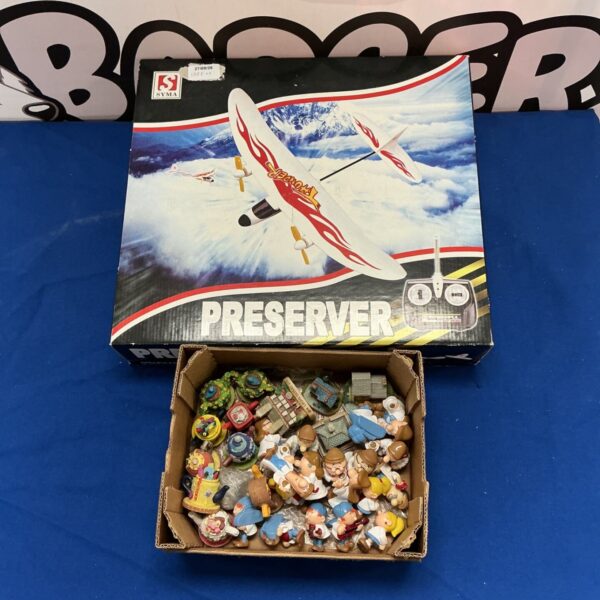 Syma Preserver RC plane with Tetley Tea Figures in box.