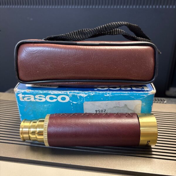 Vintage Tasco 7040 four draw telescope in its case.