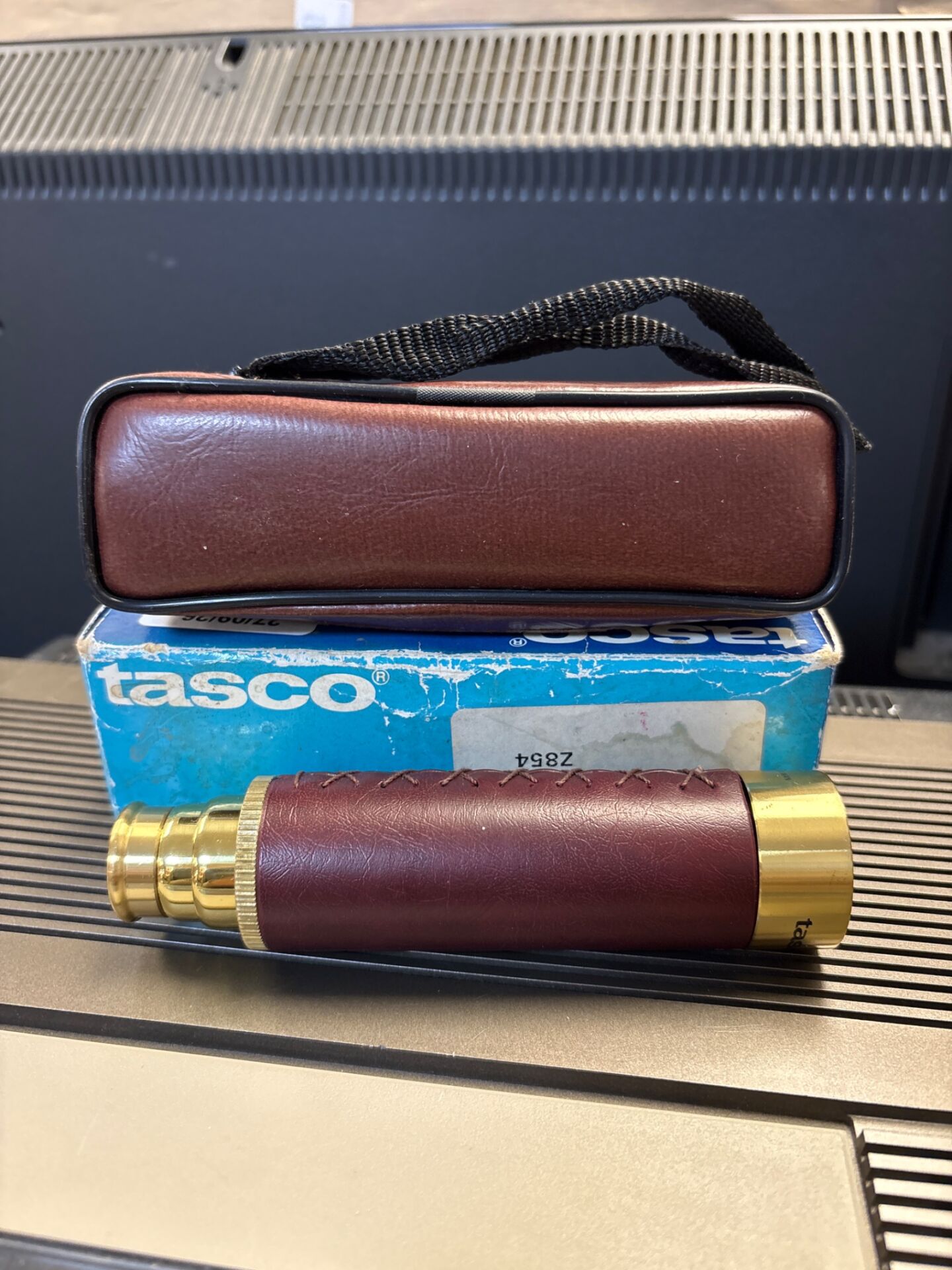196 Tasco Four draw telescope