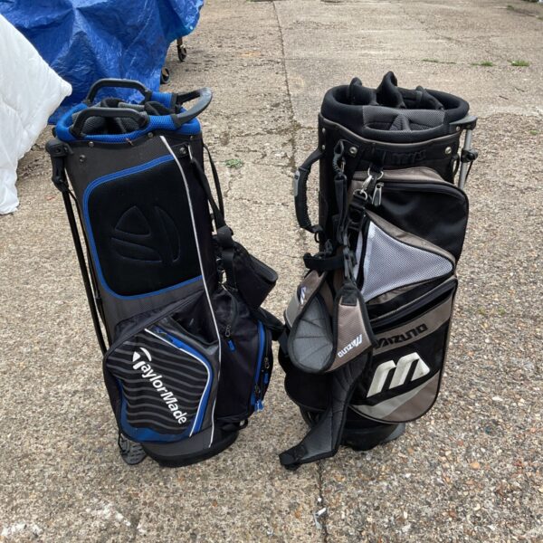TaylorMade and Mizuno golf bags, stand design, sports equipment.