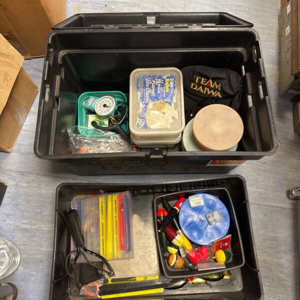 Team Daiwa fishing tackle box filled with lures and accessories.