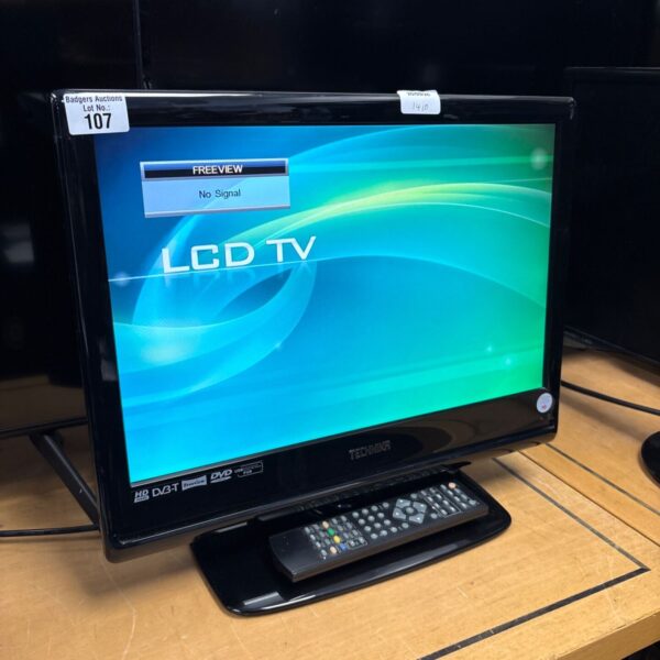 Technika 19 inch LCD TV with remote control, front view.