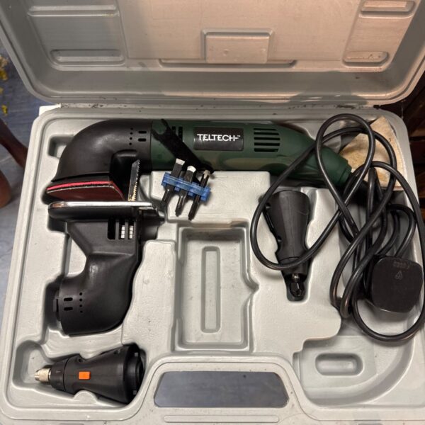Teltech multi tool set inside its original carrying case, showing attachments.