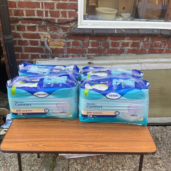 Sealed lot of Tena Proskin Comfort incontinence pads for sale.