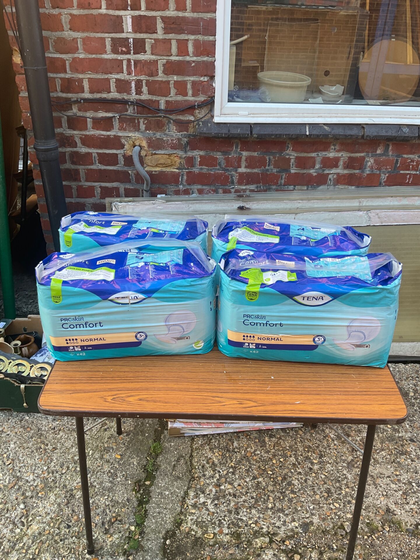 Four packs of Tena Proskin comfort pads