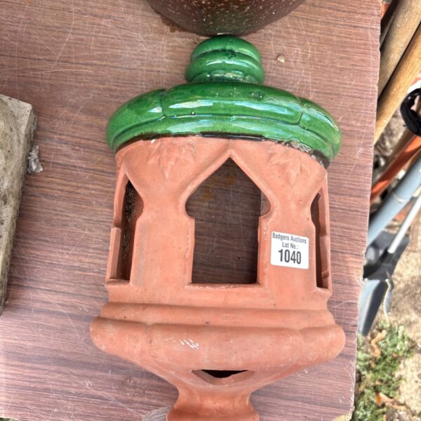 Vintage terracotta wall lantern with a glazed interior.