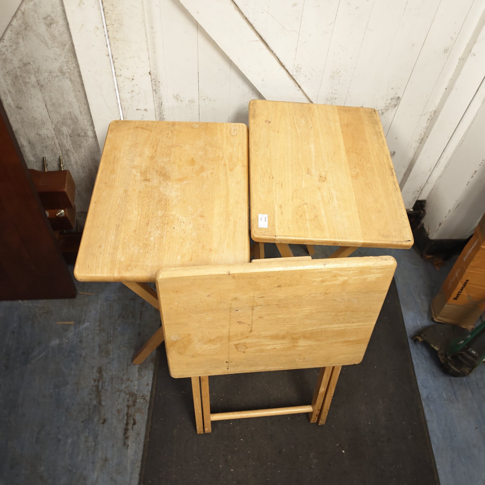 Three vintage pine folding tables, rustic and portable.