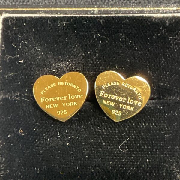 Vintage Tiffany Forever Love earrings in leather case.