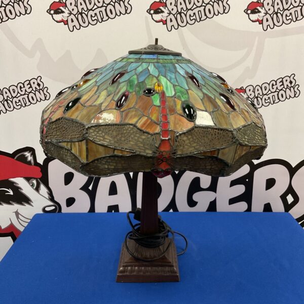 Detailed side view of a vintage tiffany style table lamp.