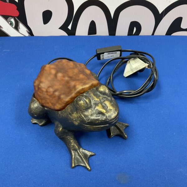 Vintage Tiffany style toad lamp with stained glass shade.