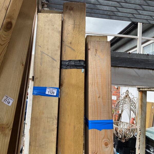 Three bundles of 7ft timber ready for construction projects.