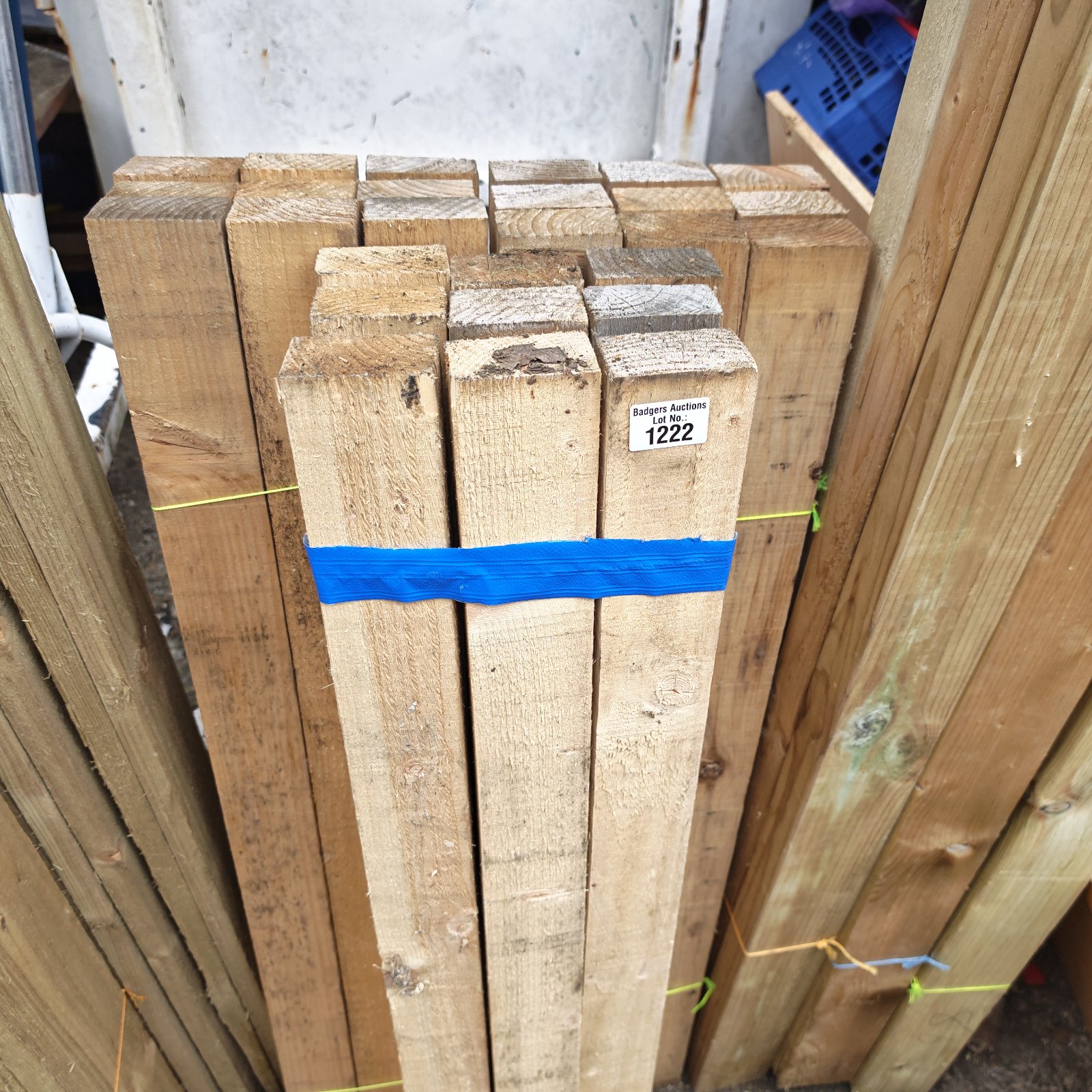 Three bundles of 4ft timber for construction and DIY projects.