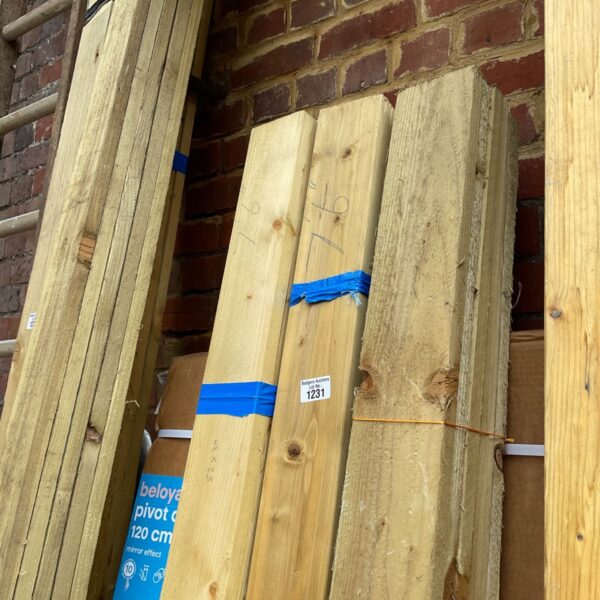 Stack of 7’6” timber bundles for construction projects.