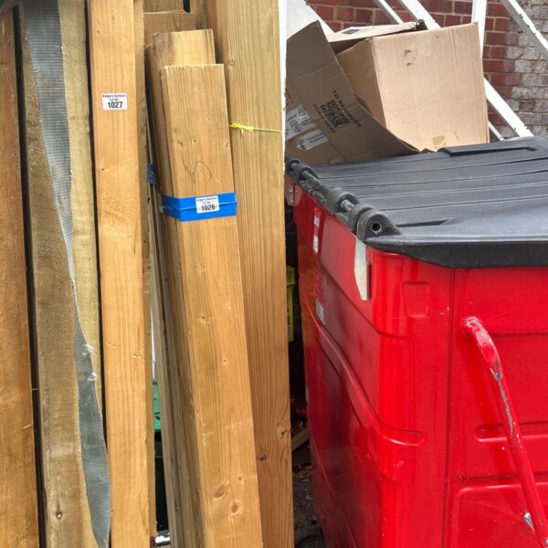 Stacked timber bundles for DIY projects and construction.