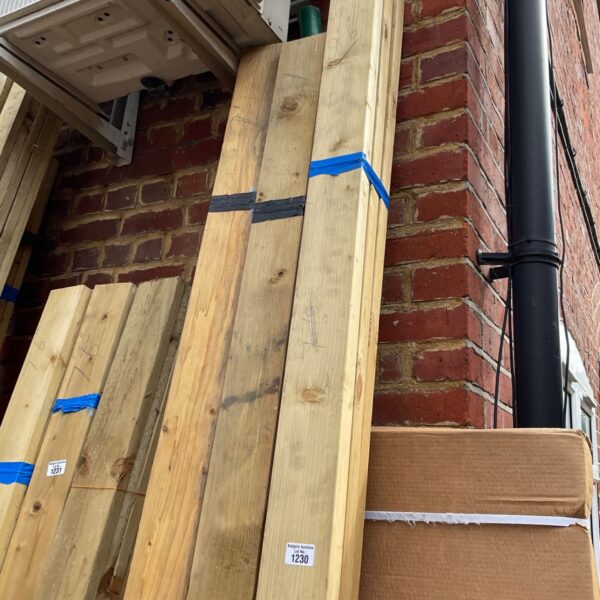Three bundles of 9ft timber secured with blue strapping.